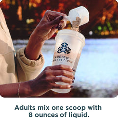 Ancient Nutrition powder being added to blender for mix