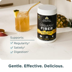 Ancient Nutrition Organic Fiber Powder pineapple mango powder in glass ready to mix in beverages