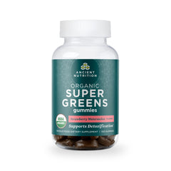 Ancient Nutrition Supergreens Gummies bottle on counter for daily wellness