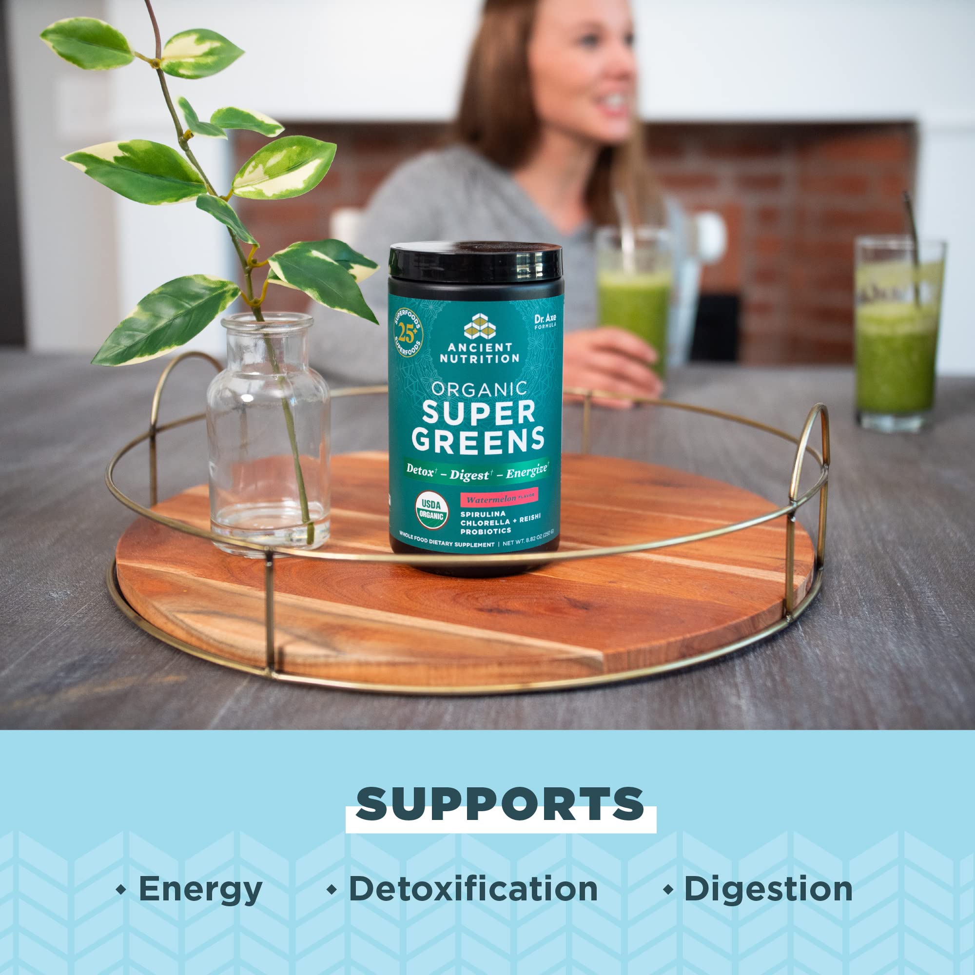 Scoop of Ancient Nutrition SuperGreens for easy, quick mixing.
