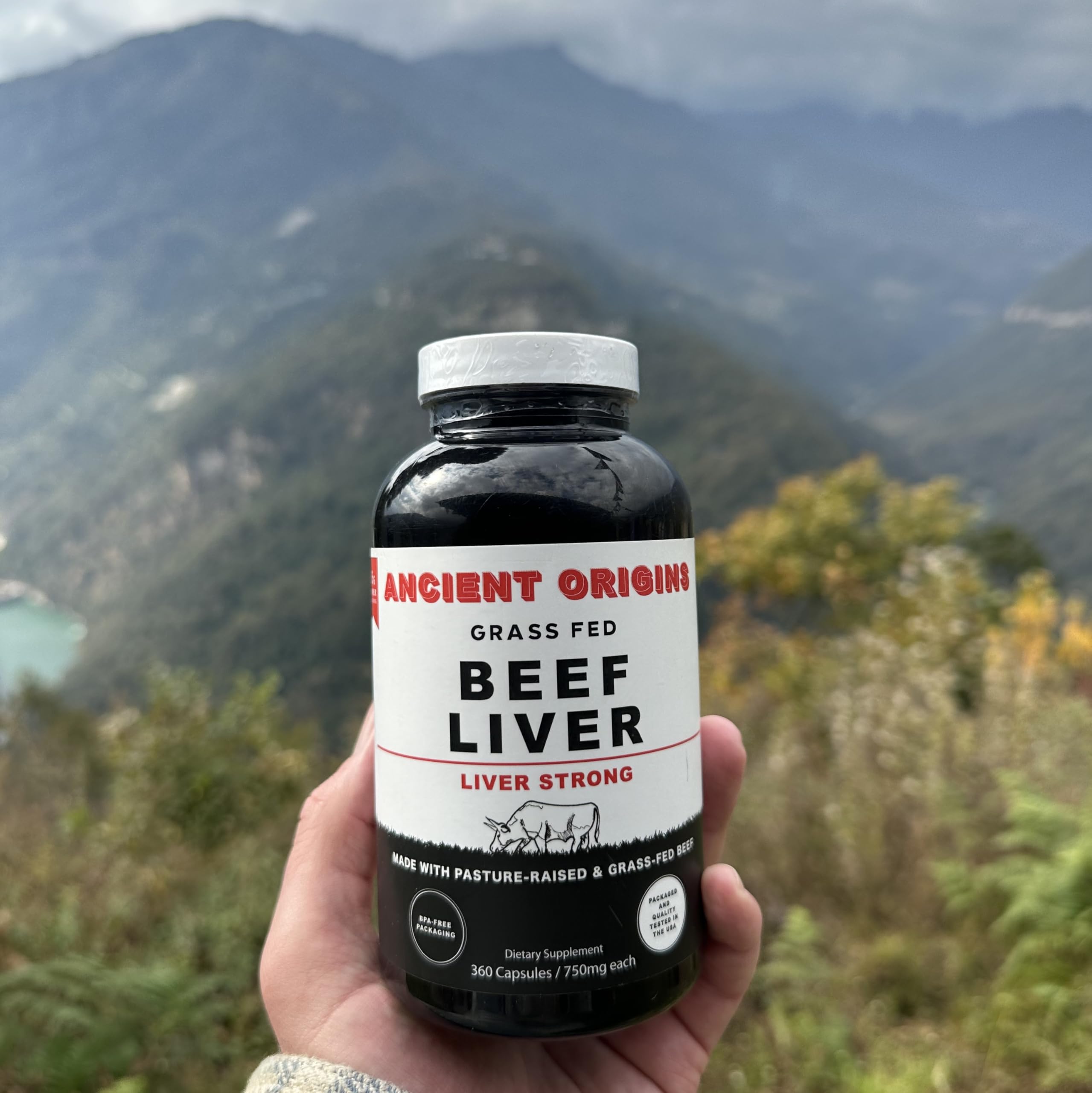 Ancient Origins daily-serving setup with beef liver capsules ready for use.