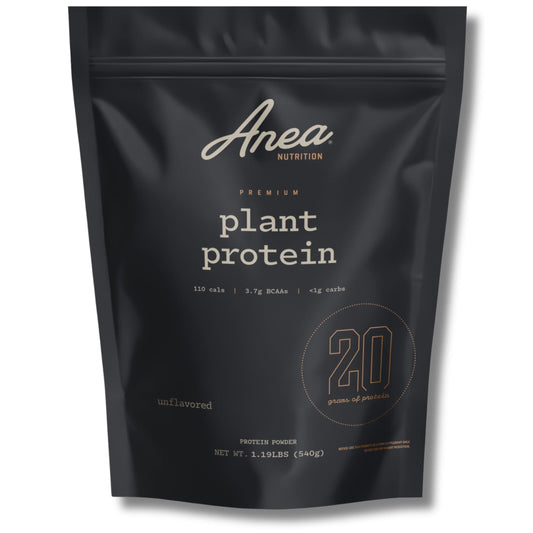 Anea Plant Protein unflavored tub, a neutral vegan protein base for smoothies.