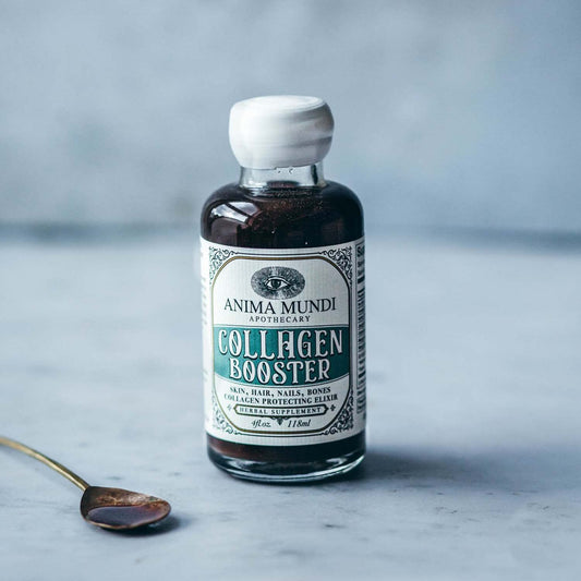 Anima Mundi Collagen Booster Elixir bottle closeup showcasing vegan formula