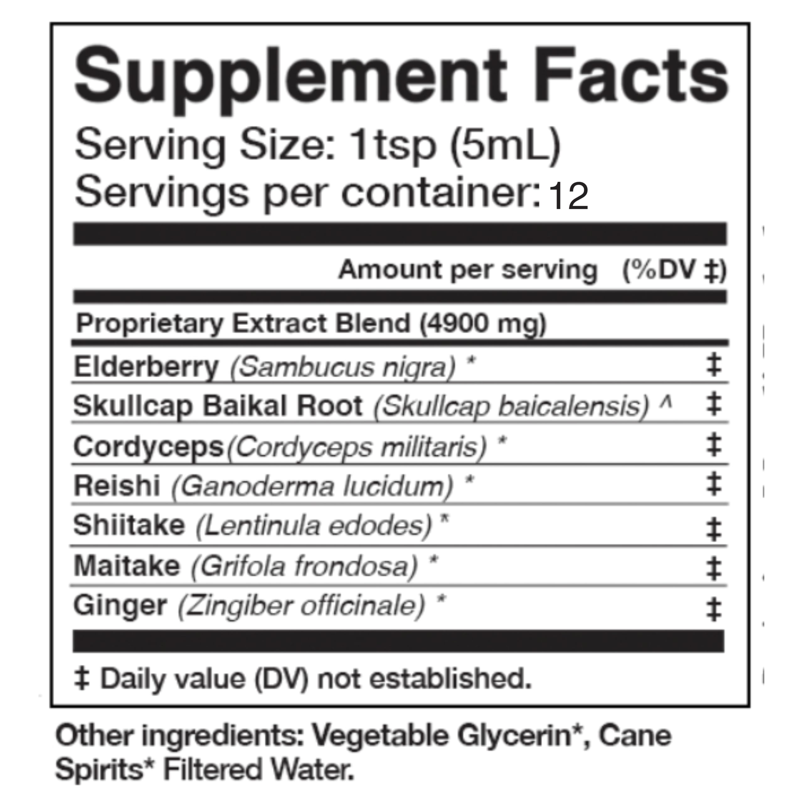 Pouring elderberry syrup over a spoon for easy dosing.