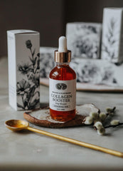 Anima Mundi Collagen Booster Oil glass bottle ready for skincare routine