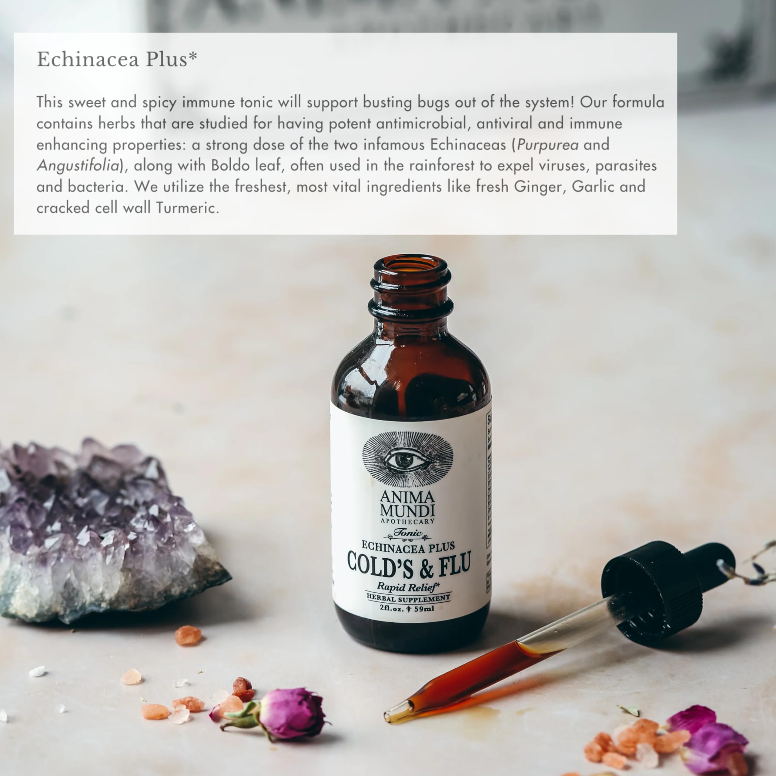 Fresh ginger root beside Anima Mundi label for warm, comforting aroma.