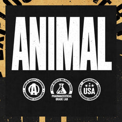 Animal TNT+ supplement bottle in hand for daily routine.