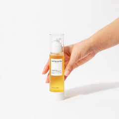 Hands apply Antevorta Feminine Wash during a gentle cleansing ritual.