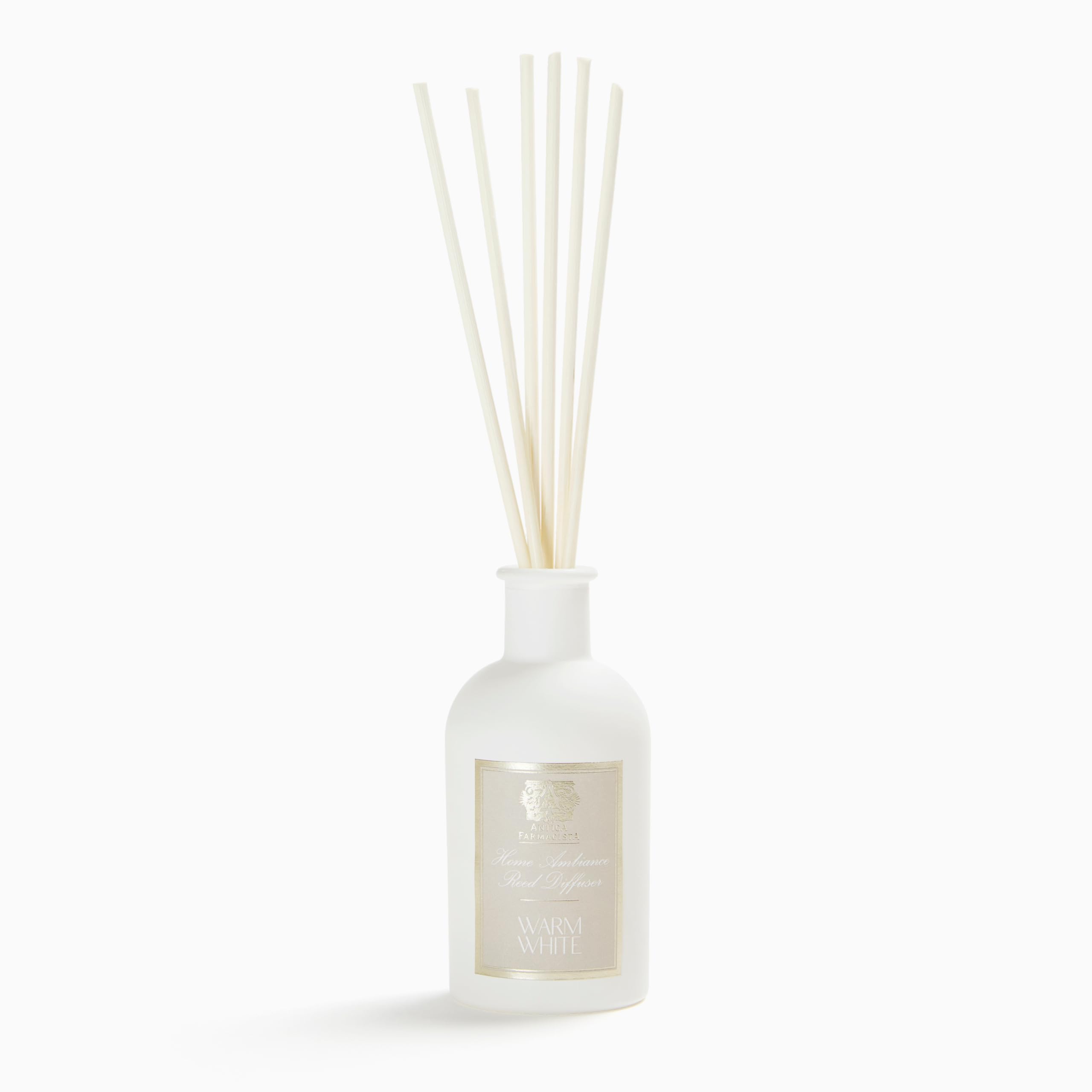 Antica Farmacista warm white diffuser bottle for cozy spaces with lasting fragrance.