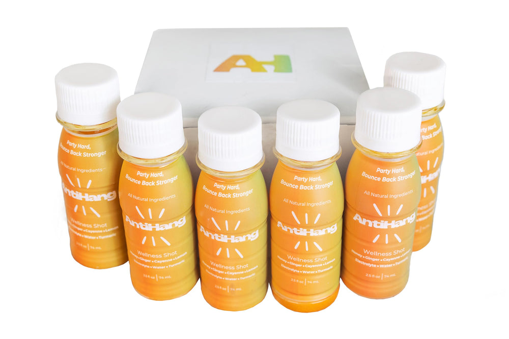 ANTIHANG bottle pour of a ginger-turmeric wellness shot for fast absorption.