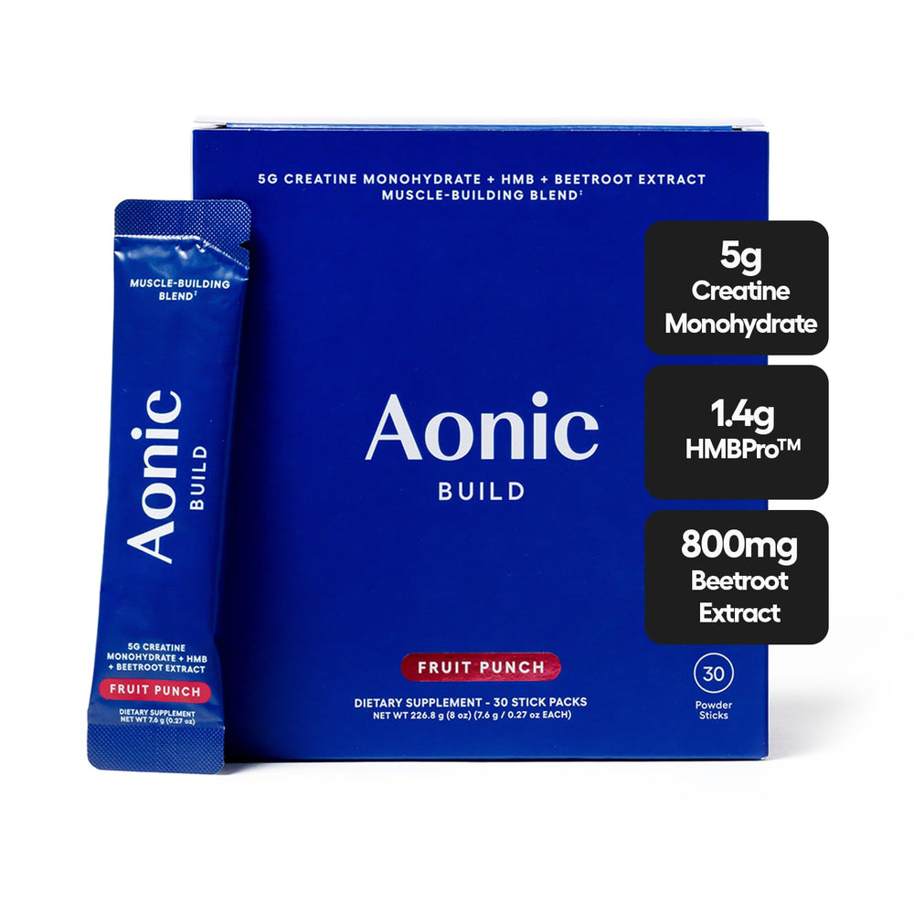 AONIC Build 3-in-1 creatine powder stick pack ready to mix during workouts.