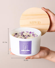 AOOVOO lavender candle beside dried botanicals evokes spa-like ambiance