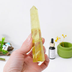 Apengshi Citrine Tower side view highlights precise facets and crystal clarity.