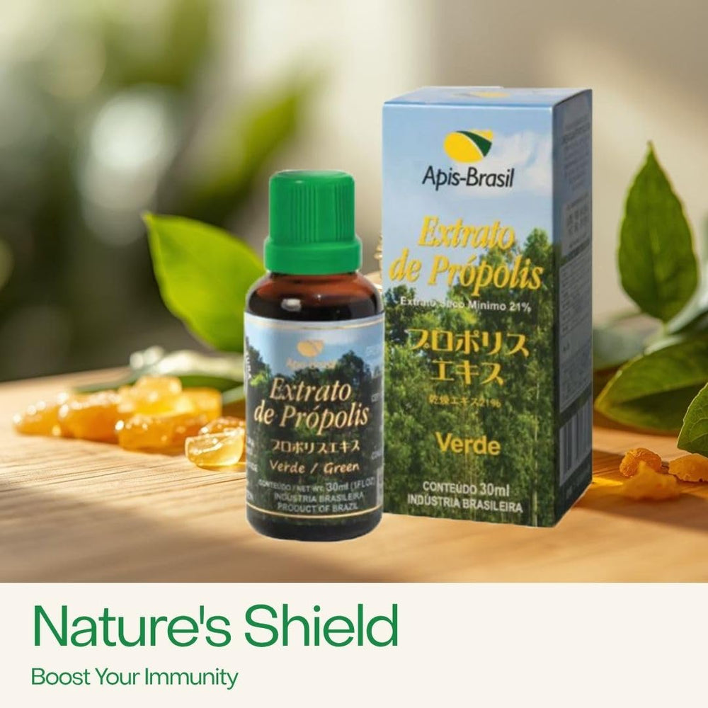 ApisBrasil propolis drops poured into a glass for easy blending.