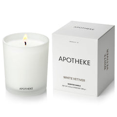 APOTHEKE White Vetiver Candle jar enhances home ambiance with timeless glass design.