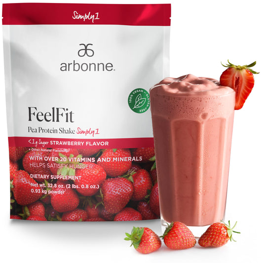 Arbonne FeelFit strawberry bottle displaying vegan pea protein benefits for smoothies.