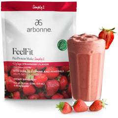 Arbonne FeelFit strawberry bottle displaying vegan pea protein benefits for smoothies.