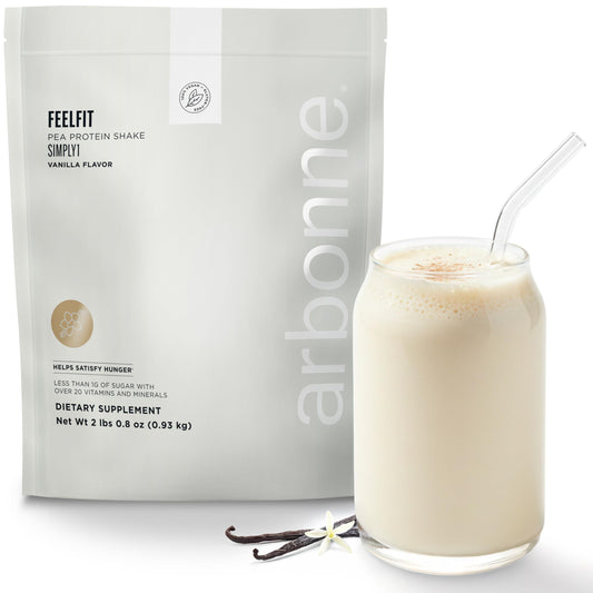 Arbonne FeelFit vanilla pea protein tub, ideal base for smoothies with plant-based nutrition.
