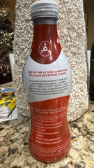 Ardyss Le’Vive Red bottle close-up reveals fresh ingredients and vibrant color