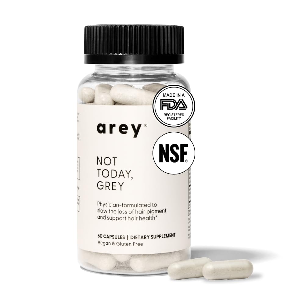 Close-up of Arey Not Today capsules for thicker, healthier hair.