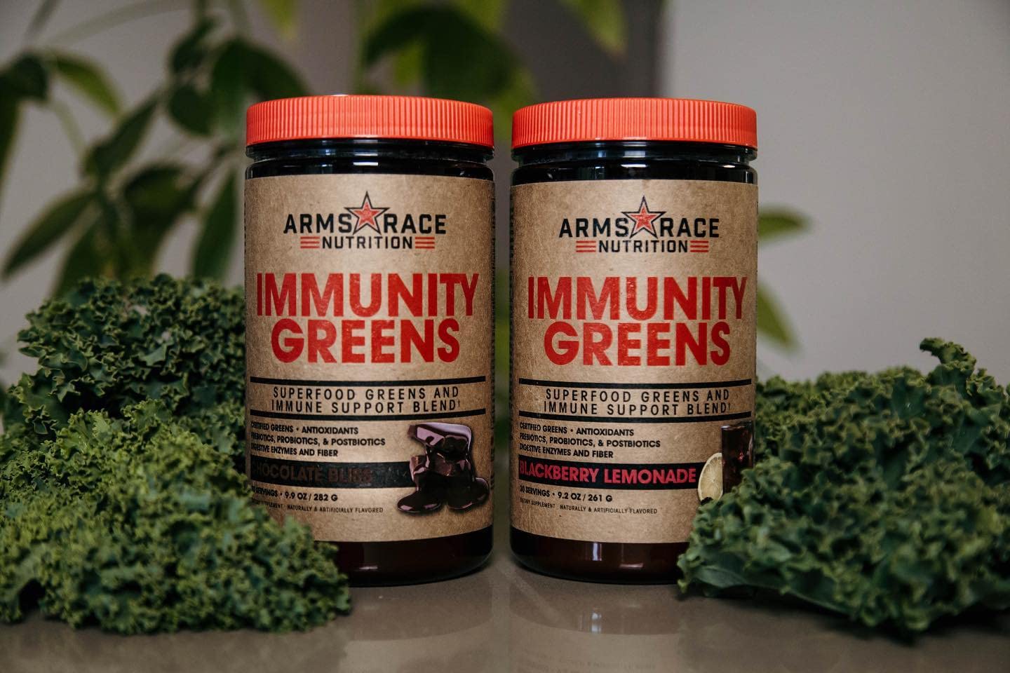Arms Race Immunity Greens powder scoop blends quickly with a Pineapple Mango beverage