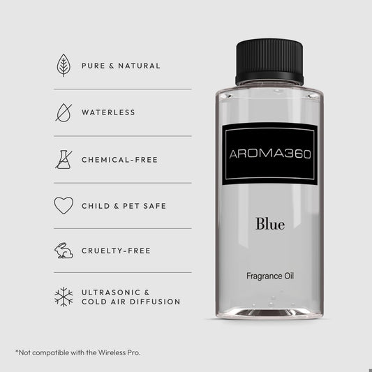 Aroma360 Blue diffuser oil closeup shows elegant amber color and premium blend.