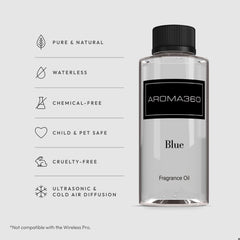Aroma360 Blue diffuser oil closeup shows elegant amber color and premium blend.