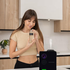 Aroma360 Across The Universe luxury fragrance oil bottle signals premium, long-lasting scent.