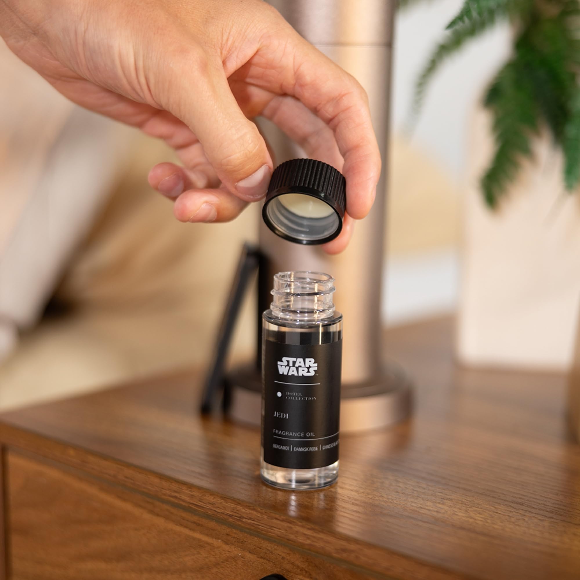 Aroma360 Star Wars Jedi fragrance enhances immersive ambiance in a softly lit space.