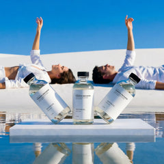 AROMASOUL Romantic Encounter hotel-style scent bottle on nightstand for ambiance.
