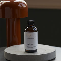 AromaTech Peach The Hotel oil bottle with inviting peach notes.