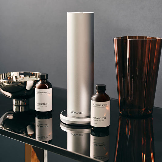 AromaTech Pumpkin Spice diffuser usage shows warm autumn ambiance in rooms