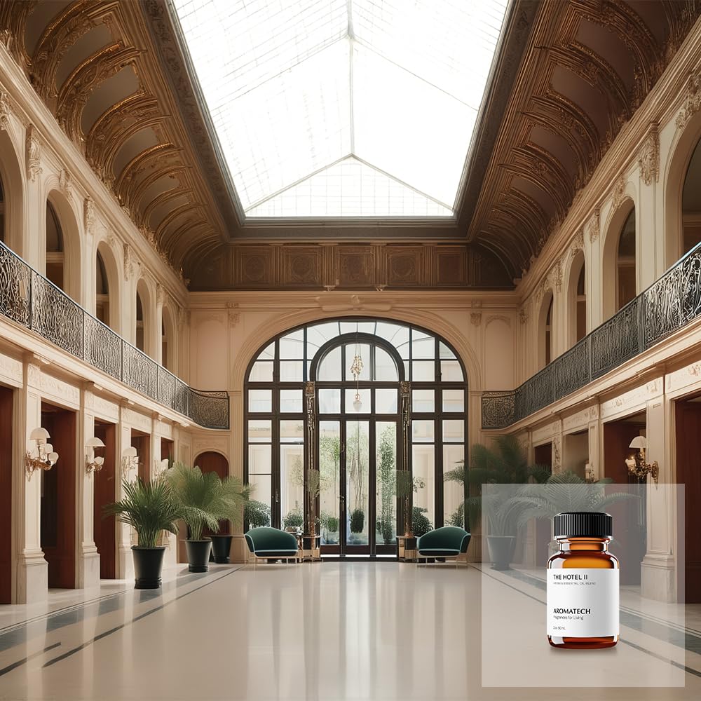 Aromatech The Hotel II bottle beside a diffuser to evoke luxury living.