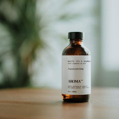 AromaTech White Tea & Bamboo essential oil drops highlight a pure blend.