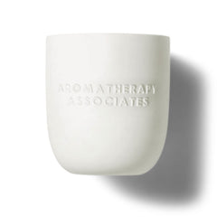 Chamomile oil blend enhances relaxation when the candle is lit.