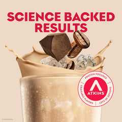 Atkins Coffee Lovers Cafe au Lait bottle pour; rich flavor and fiber.