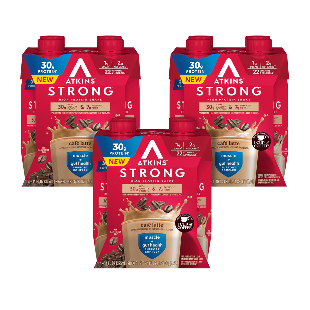 Atkins Strong Café Latte shake bottle on a kitchen countertop, high-protein convenience for busy mornings.