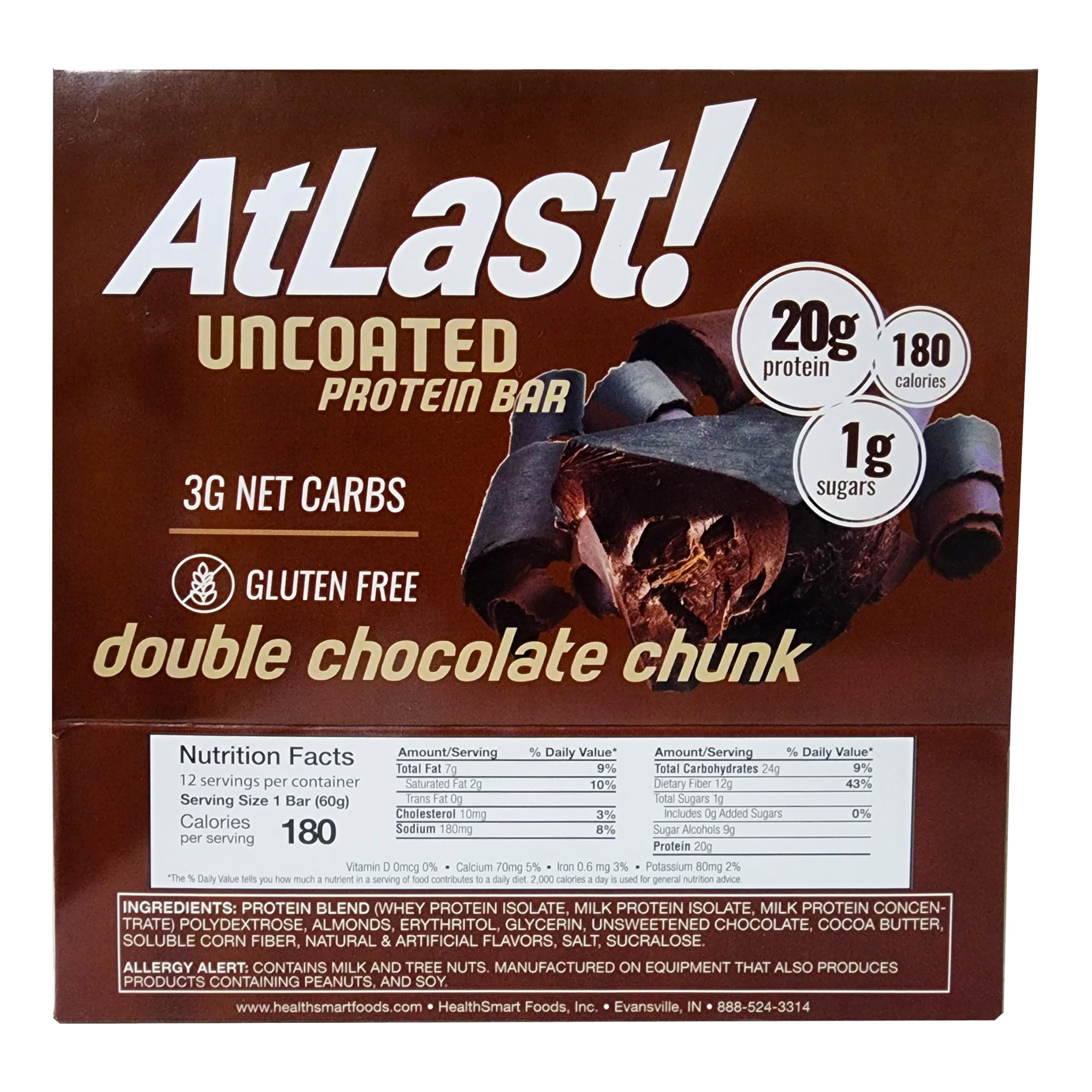 AtLast Double Chocolate Chunk bar texture closeup showing real chocolate chunks.