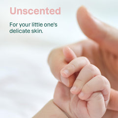 BABY ATTITUDE 2-in-1 bottle being held, fragrance-free formula for sensitive noses.