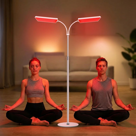 Aumtrly red light therapy lamp on a stable stand for home use.