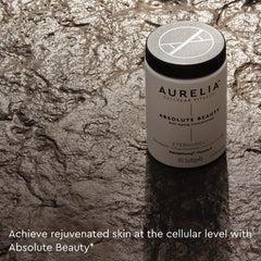 AURELIA Absolute Beauty in-use scene implies daily renewal and smoother texture.