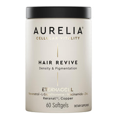 AURELIA Hair Revive bottle on a clean vanity for daily hair support.