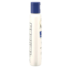Applying Aveeno Anti-Itch Lotion to forearm for itch relief