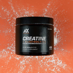 AX Nutrition Creatine Electrolytes scoop dispensing image shows easy serving for energy during training.