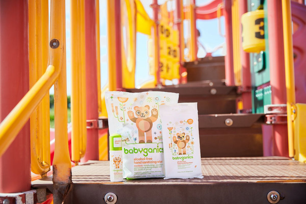 Babyganics sanitizer being used by a child for quick hygiene.