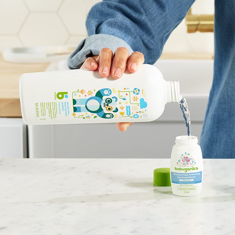 Moisturizing foam shown on hands using Babyganics sanitizer.