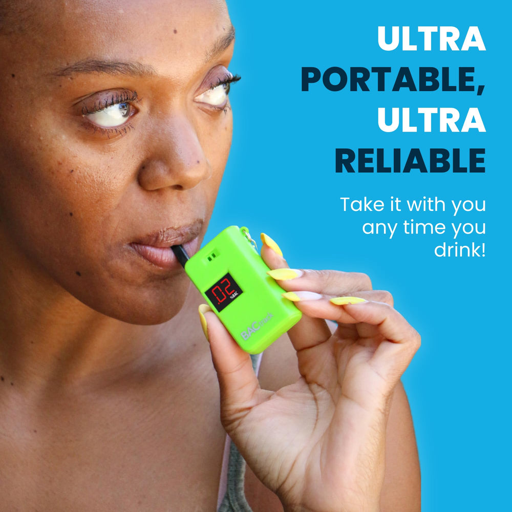 BACtrack keychain breathalyzer green pocket-size device ready for purse or pocket use