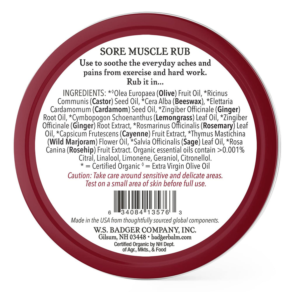 Badger Sore Muscle Rub tin close-up label, cayenne and ginger warming blend