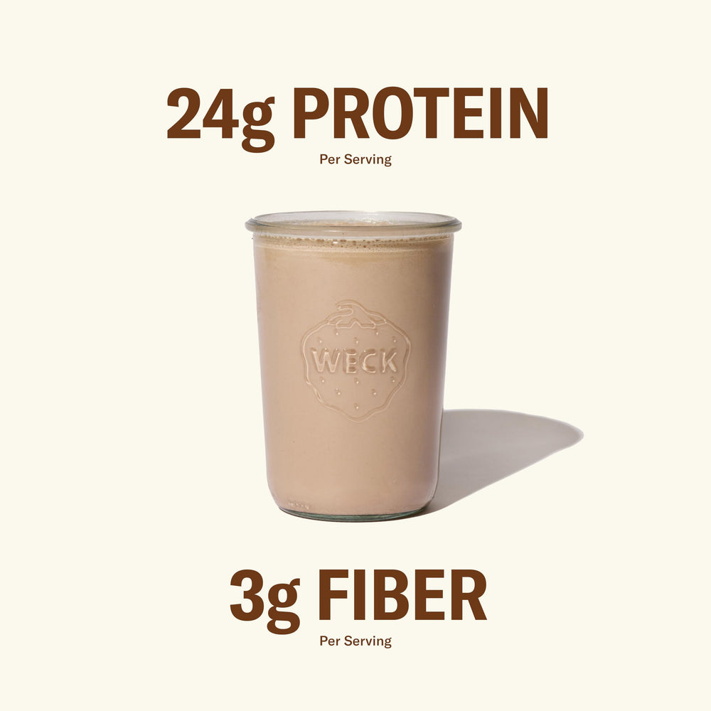 Shaker pouring Ballerina Farm powder for a quick shake.