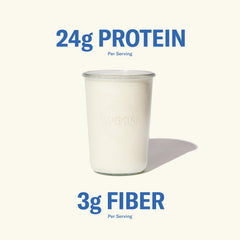Ballerina Farm vanilla protein being poured into a smoothie.